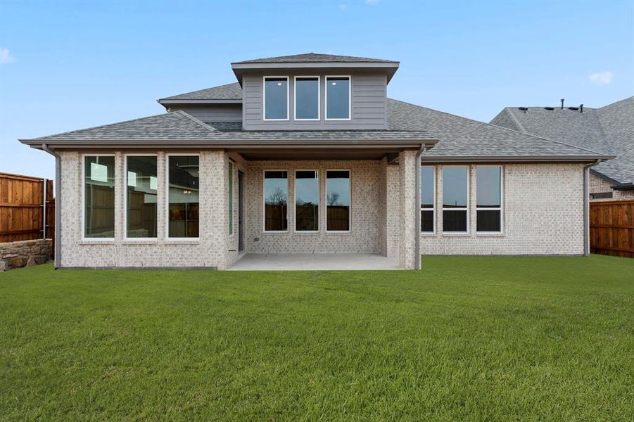 Exterior details and patio area of a home in The Homestead - 62', Rockwall (Image 3).
