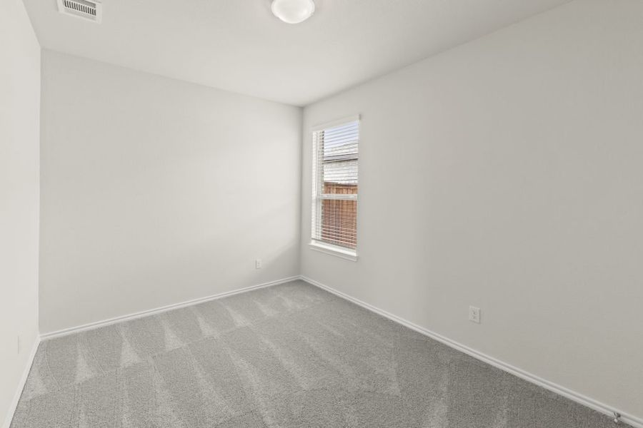 Representative exterior photo of a completed home built from the Cottonwood by Impression Homes in Northspur, Terrell, TX (Image 15).