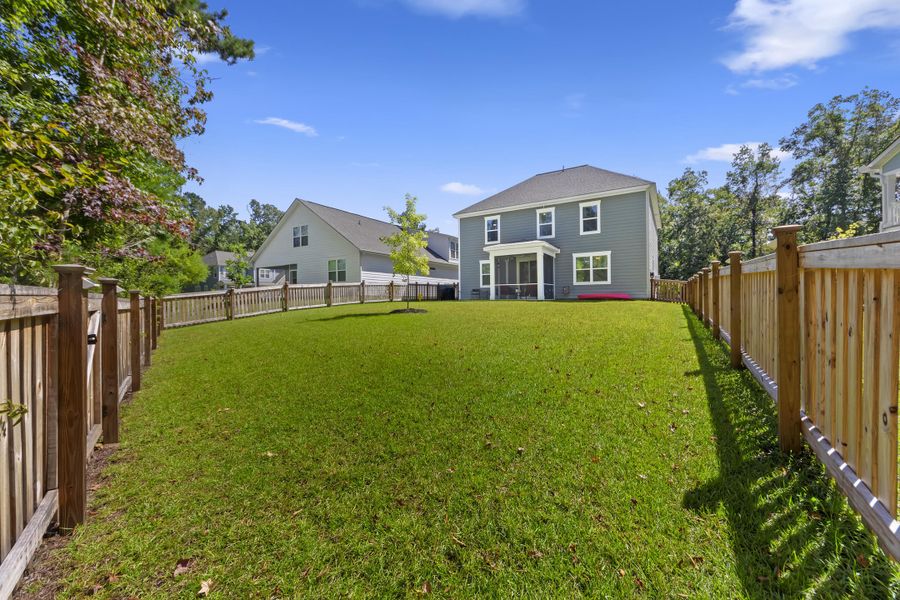Front exterior of a new home in The Ponds, Summerville, SC, highlighting curb appeal (Image 19).