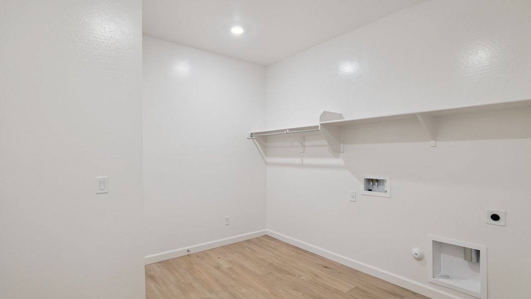 Spacious, unfurnished interior of a new home in Zanjero Pass, Waddell (Image 42).