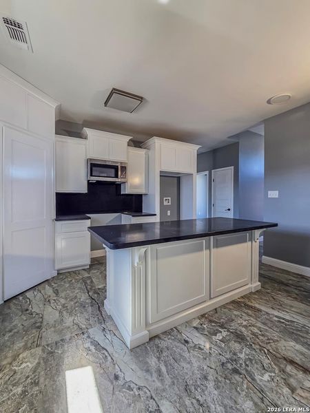 Furnished interior view inside a new home in , Eagle Pass (Image 6).
