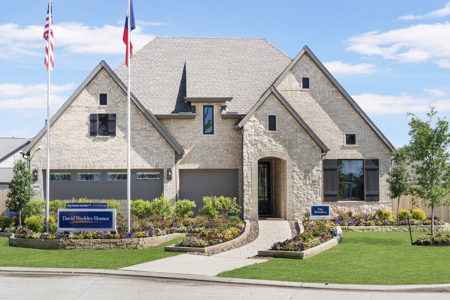 Front exterior of a new home in The Meadows at Imperial Oaks, Conroe, TX, highlighting curb appeal (Image 20).