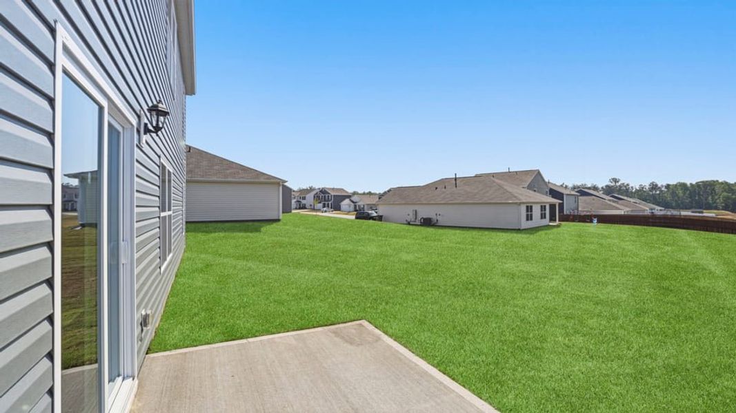 Exterior details and patio area of a home in Bentley Park, Greenwood (Image 3).