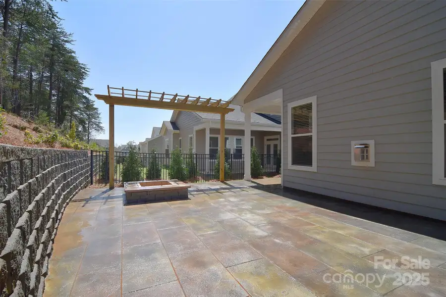 Exterior details and patio area of a home in Wildbrook, Denver (Image 25).