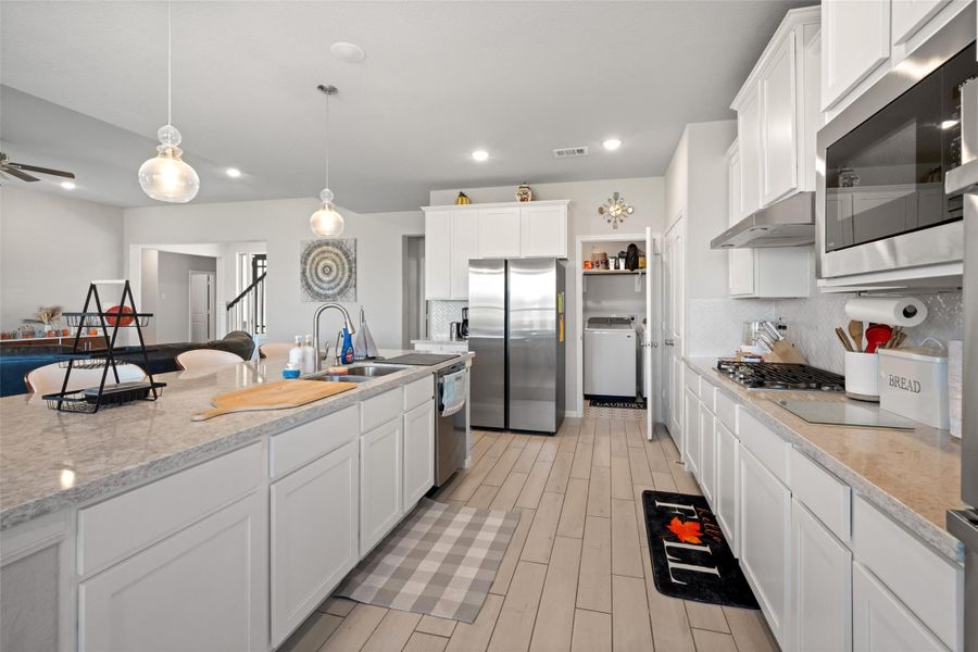 Furnished interior view inside a new home in Waterstone on Lake Conroe, Montgomery (Image 14).