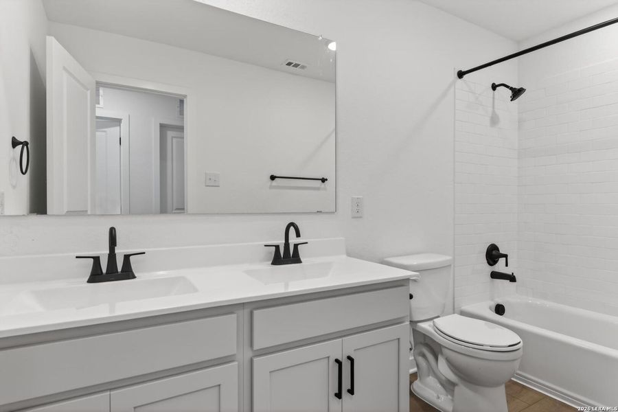Furnished interior view inside a new home in Cordova Trails, Seguin (Image 11).