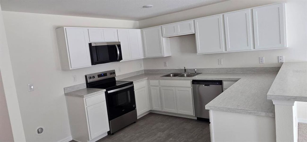 Furnished interior view inside a new home in , Poinciana (Image 4). Furnished interior view inside a new home in , Poinciana (Image 4).