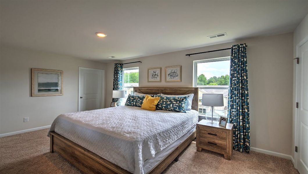 Representative furnished interior of a home built from the Clement by D.R. Horton in Virginia Commons, Arden (Image 16).