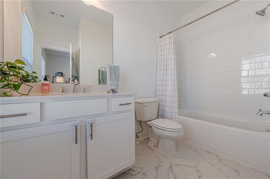 Furnished interior view inside a new home in , Suwanee (Image 33).