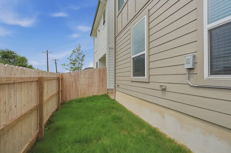 Exterior details and patio area of a home in Rose Hill, San Antonio (Image 26).