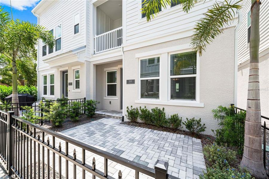 Front exterior of a new home in , Sarasota, FL, highlighting curb appeal (Image 1).