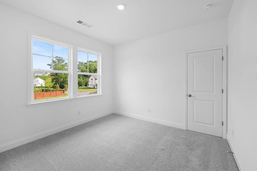 Representative unfurnished interior of a home built from the Lawrence by Taylor Morrison in Watson Park, Snellville (Image 22).