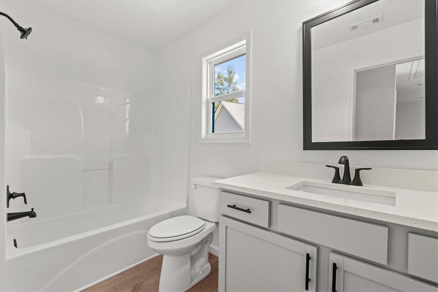 Furnished interior view inside a new home in , Carrollton (Image 7).