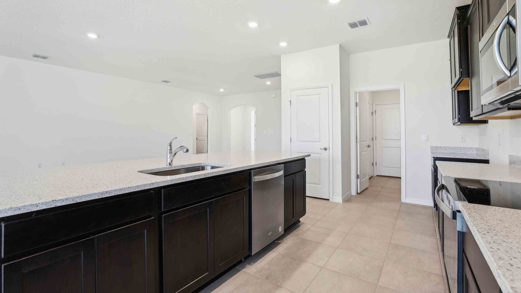 Representative furnished interior of a home built from the Laurel by D.R. Horton in Ocala Preserve, Ocala (Image 10).