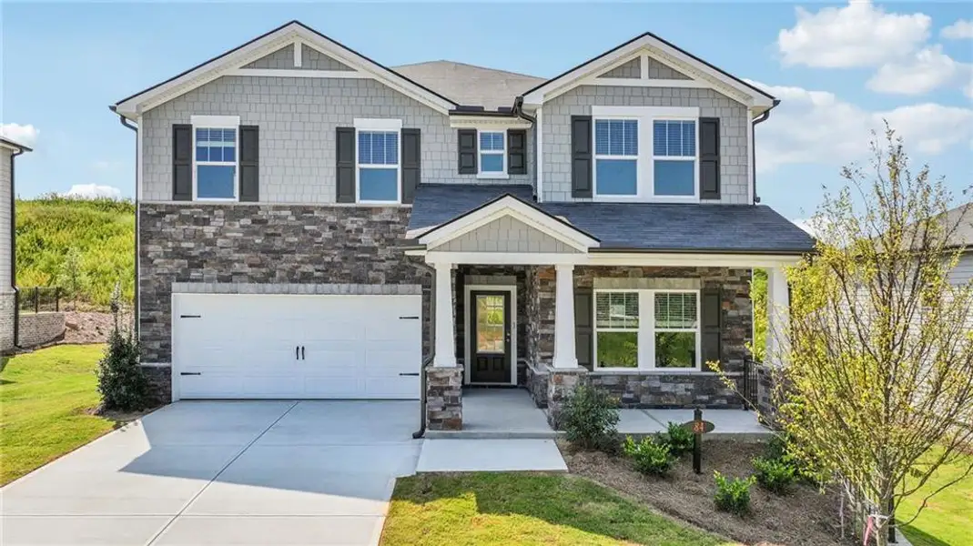 Front exterior of a new home in Preserve at Mountain Creek, Pendergrass, GA, highlighting curb appeal (Image 1).