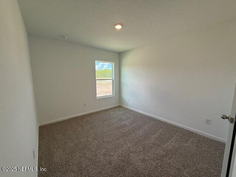 Spacious, unfurnished interior of a new home in Grand Reserve, Bunnell (Image 10).