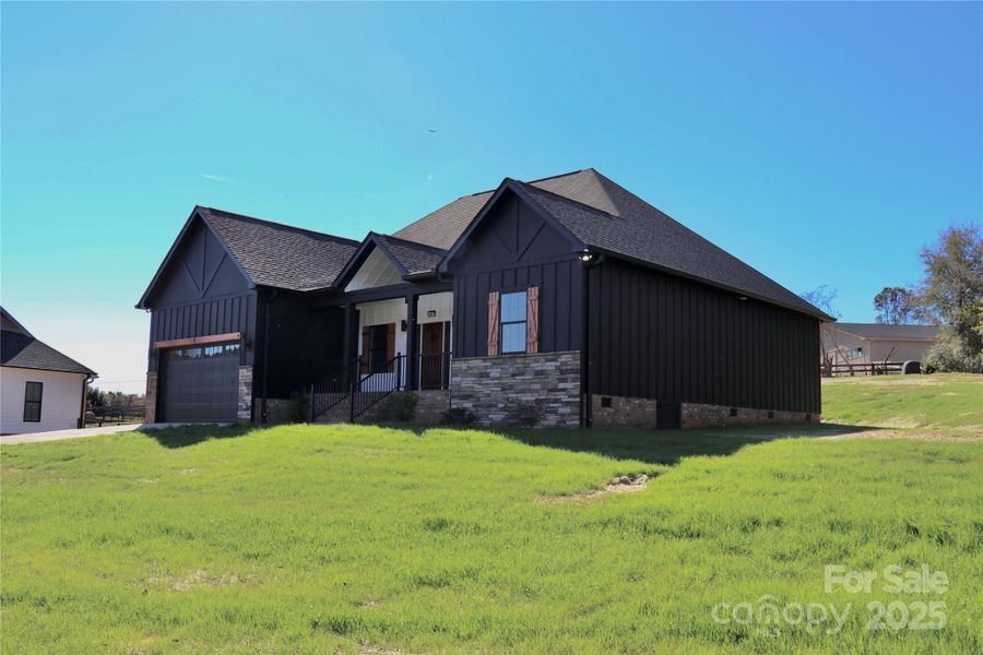 Front exterior of a new home in , Maiden, NC, highlighting curb appeal (Image 1). Front exterior of a new home in , Maiden, NC, highlighting curb appeal (Image 1).