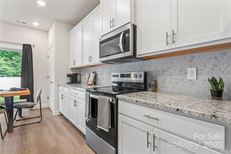 Furnished interior view inside a new home in Henderson Manor, Charlotte (Image 15).