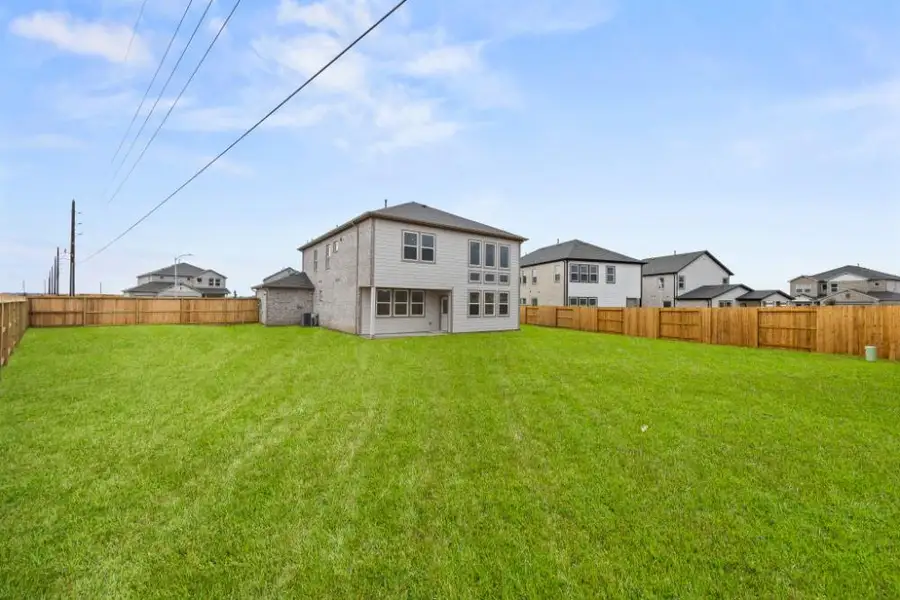 Exterior details and patio area of a home in , Iowa Colony (Image 15). Exterior details and patio area of a home in , Iowa Colony (Image 15).
