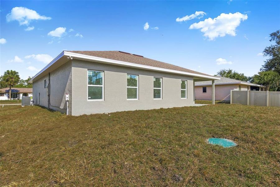 Exterior details and patio area of a home in , Port Charlotte (Image 27).