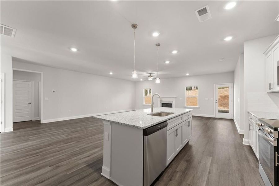 Furnished interior view inside a new home in Wood Creek Landing, Leland (Image 5).