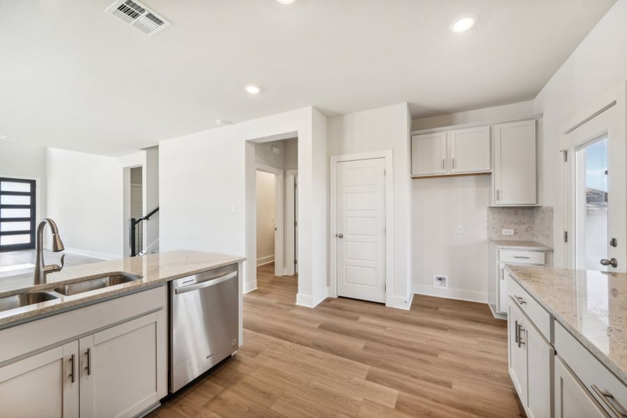 Kitchen in the Medina floorplan at a Meritage Homes community.