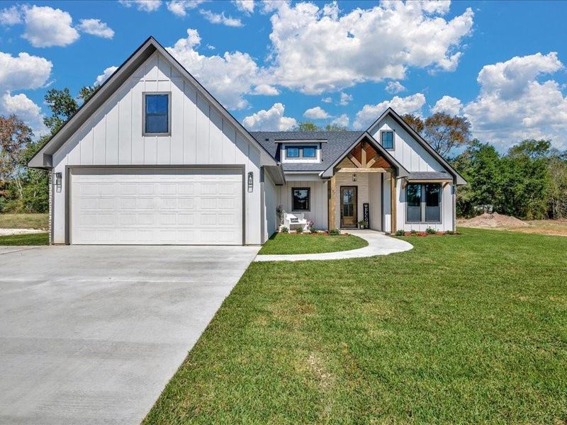 Front exterior of a new home in , Lufkin, TX, highlighting curb appeal (Image 1). Front exterior of a new home in , Lufkin, TX, highlighting curb appeal (Image 1).