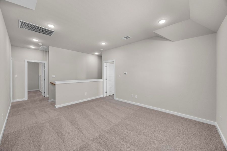 Game Room in the Magnolia home plan by Trophy Signature Homes – REPRESENTATIVE PHOTO Game Room in the Magnolia home plan by Trophy Signature Homes – REPRESENTATIVE PHOTO