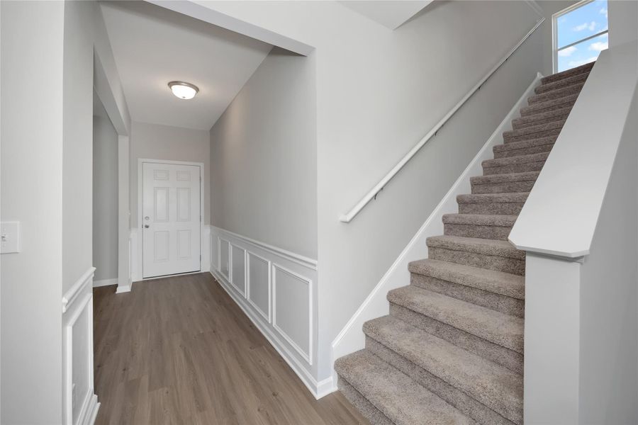 The Harrington- Stairway to second floor. Sample image for illustration; upgrades, options, and colors may vary. The Harrington- Stairway to second floor. Sample image for illustration; upgrades, options, and colors may vary.