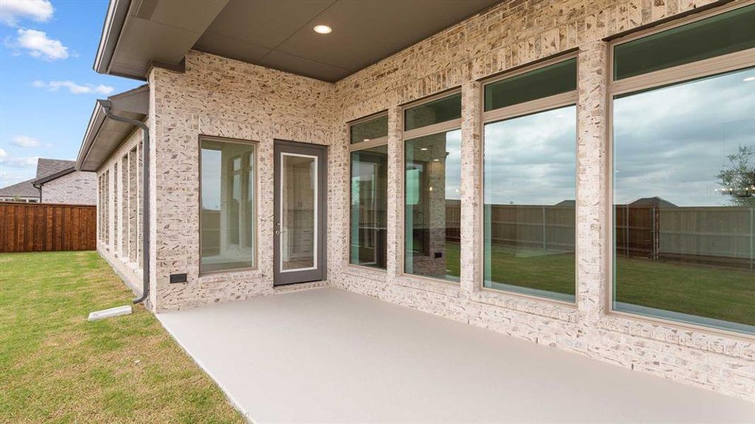 Exterior details and patio area of a home in Myrtle Creek 71', Waxahachie (Image 3).