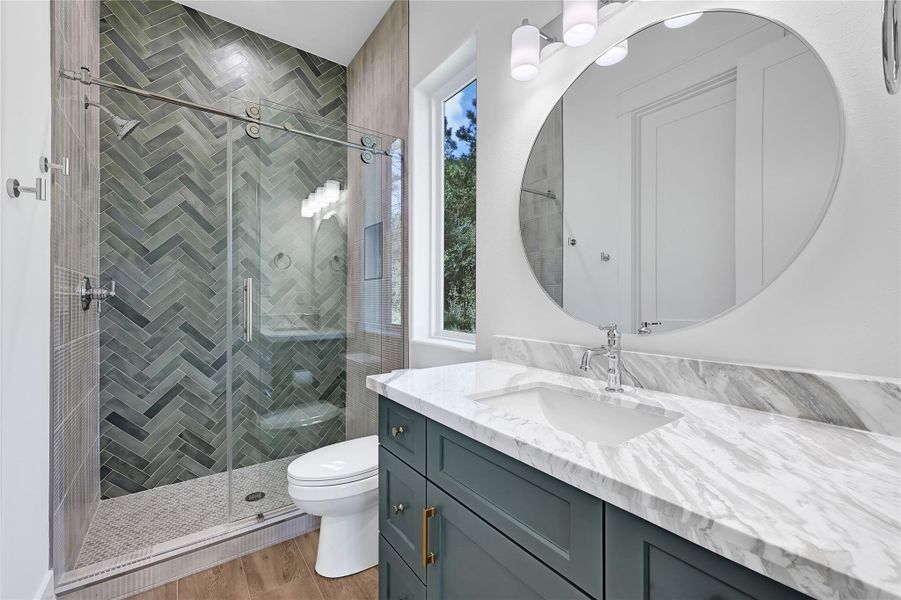 Guest bedroom en-suite with custom tile