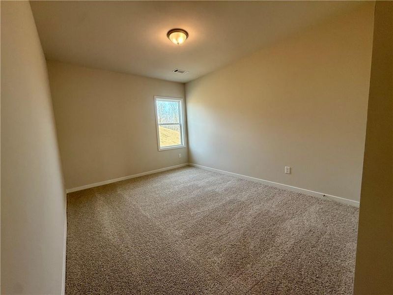 Spacious, unfurnished interior of a new home in Ponderosa Farms Manor, Gainesville (Image 46).