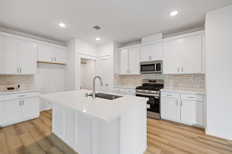 Furnished interior view inside a new home in Sunterra, Katy (Image 6). Furnished interior view inside a new home in Sunterra, Katy (Image 6).