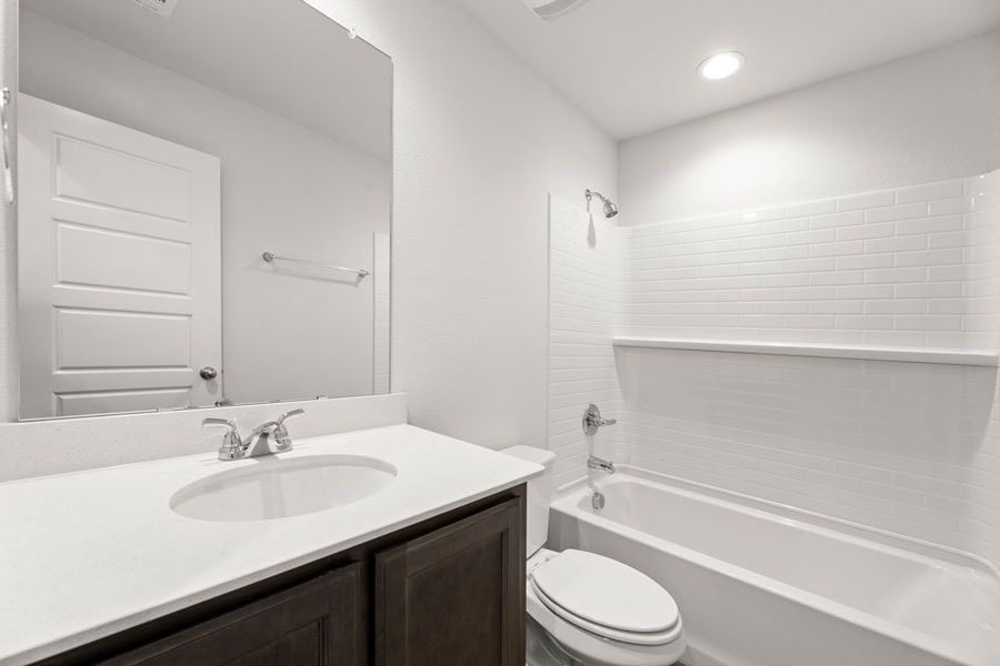 Representative exterior photo of a completed home built from the Lincoln by Impression Homes in DeBerry Reserve, Royse City, TX (Image 15).