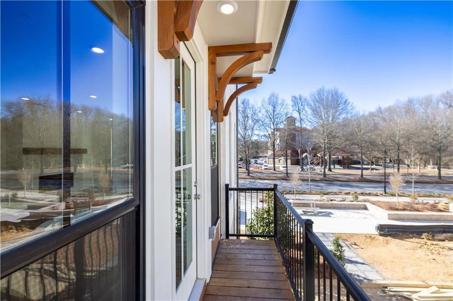 Just off the dining area/family room is a side balcony that allows you to open up the door to let in the fresh breeze.