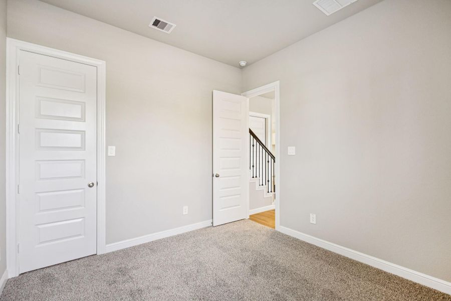 Spacious, unfurnished interior of a new home in Kemah Crossing - Luxe Series, Kemah (Image 22).