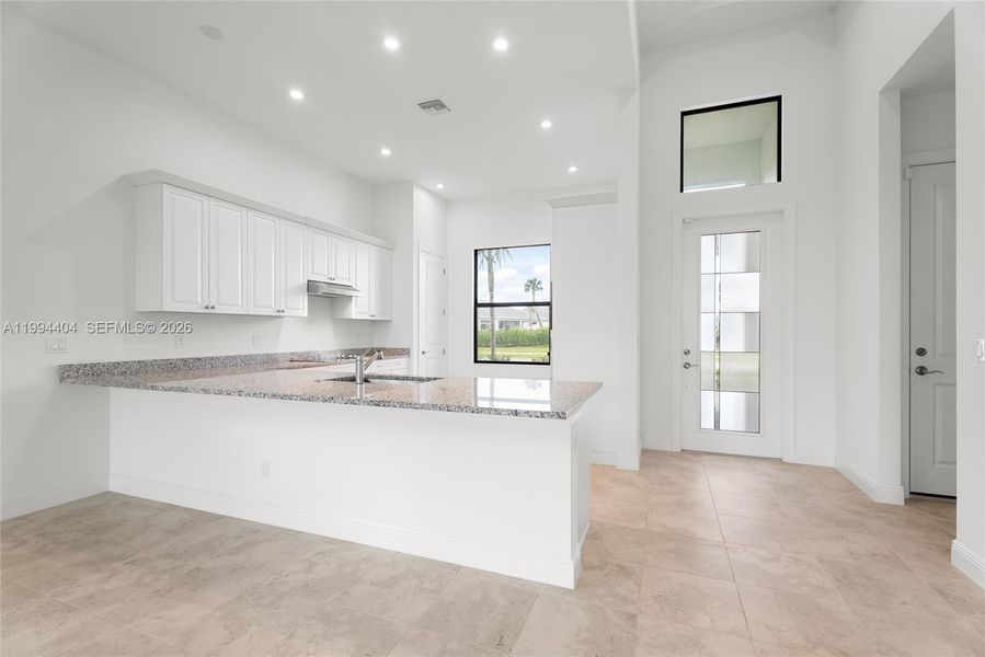 Furnished interior view inside a new home in , Port St. Lucie (Image 8).
