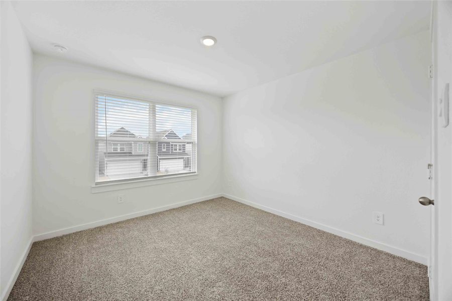 Spacious, unfurnished interior of a new home in Grand West, Houston (Image 11).