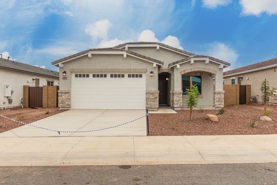 Front exterior of a new home in Avanti at Granite Vista, Waddell, AZ, highlighting curb appeal (Image 20).