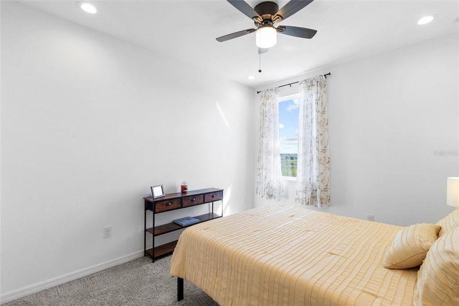 Furnished interior view inside a new home in Isles at Bayview, Parrish (Image 49).
