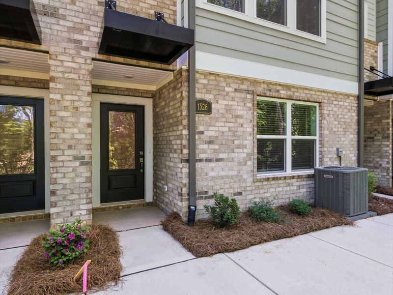 Exterior details and patio area of a home in Central Living at Craig, Charlotte (Image 3). Exterior details and patio area of a home in Central Living at Craig, Charlotte (Image 3).