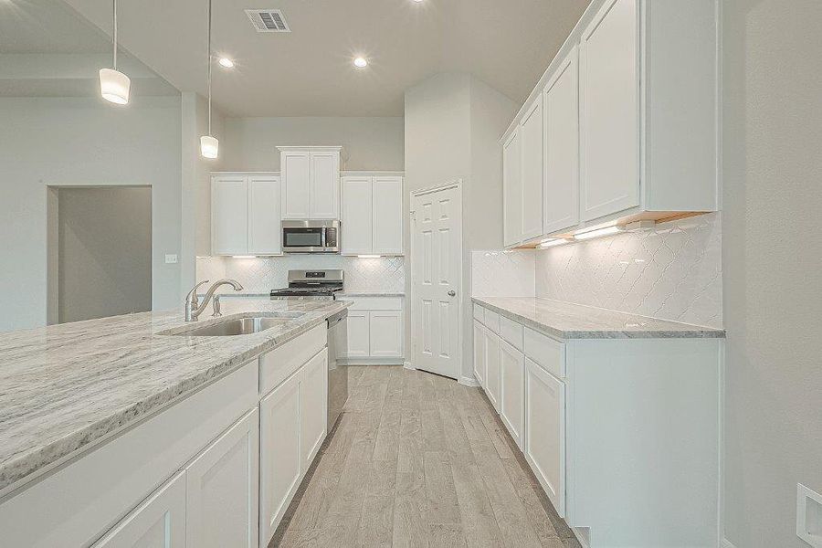 Furnished interior view inside a new home in Grand Magnolia, Magnolia (Image 27).