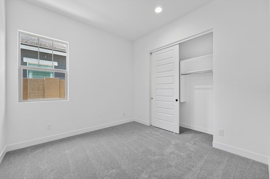 Spacious, unfurnished interior of a new home in Ellsworth Ranch, Queen Creek (Image 25).