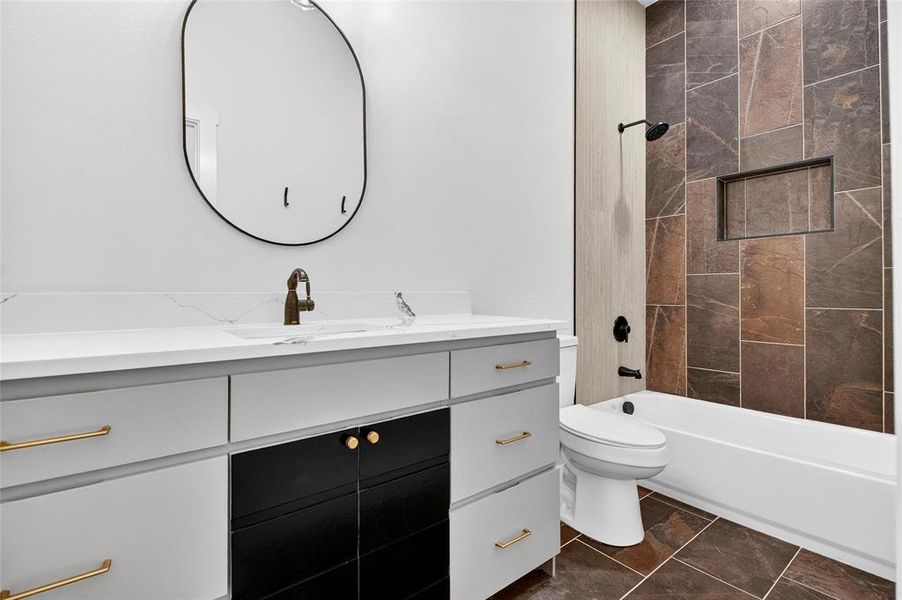 Bathroom with vanity and washtub / shower combination Bathroom with vanity and washtub / shower combination