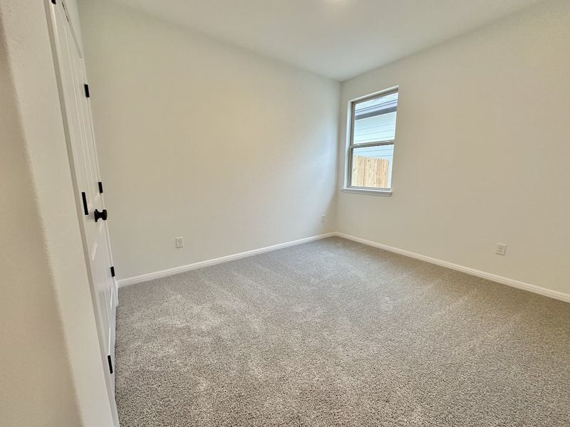 Spacious, unfurnished interior of a new home in Sage Hollow, Kyle (Image 14).