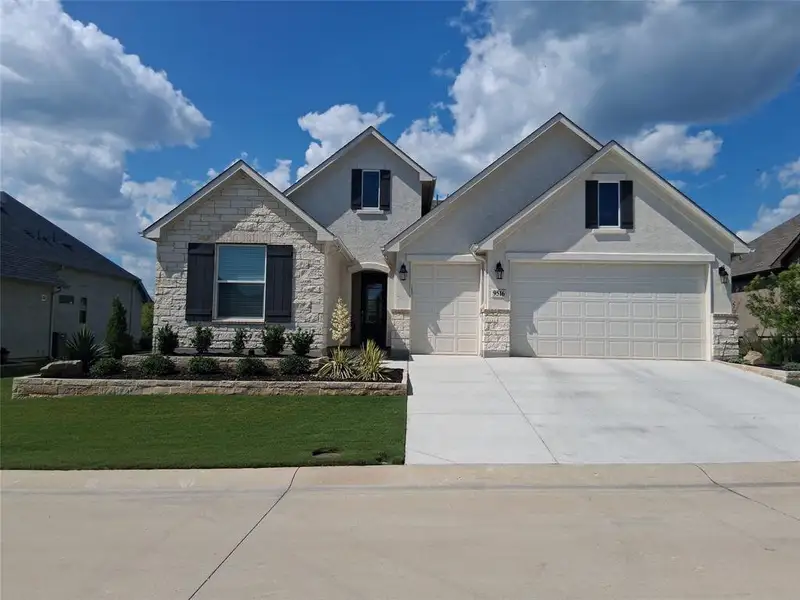 Front exterior of a new home in , Denton, TX, highlighting curb appeal (Image 2). Front exterior of a new home in , Denton, TX, highlighting curb appeal (Image 2).