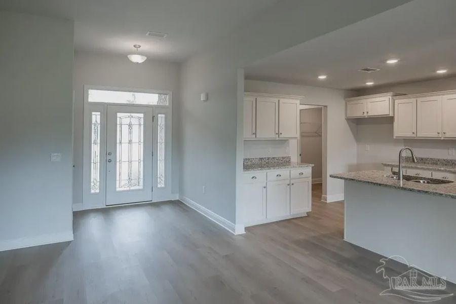 Representative unfurnished interior of a home built from the Plan 1740 by Adams Homes in Ashton View, Crestview (Image 11). Representative unfurnished interior of a home built from the Plan 1740 by Adams Homes in Ashton View, Crestview (Image 11).