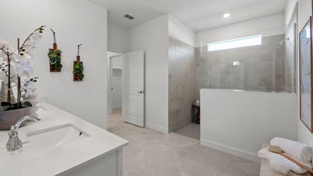 Furnished interior view inside a new home in Island Lakes at Coco Bay, Englewood (Image 18).