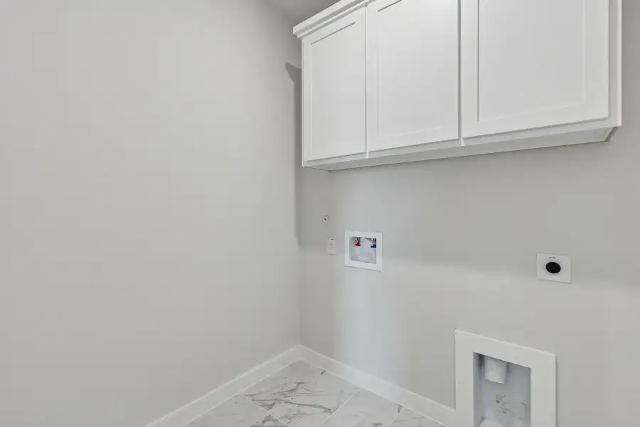 Utility Room in the Stanley II home plan by Trophy Signature Homes – REPRESENTATIVE PHOTO