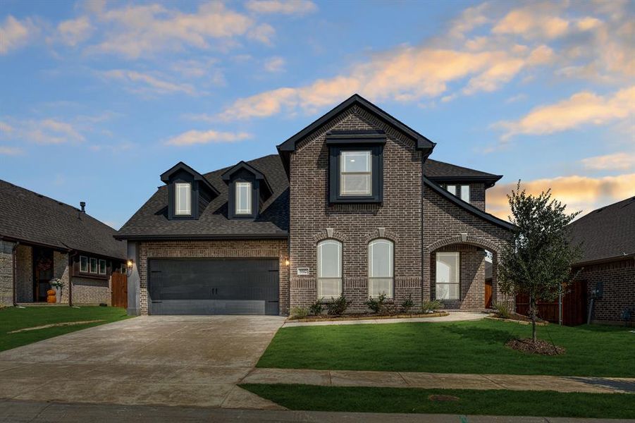 Front exterior of a new home in Country Lakes Classic 60, Argyle, TX, highlighting curb appeal (Image 22).